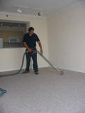 Carpet Cleaning Miami - Technician Cleaning Carpet Top Steamer 305-631-5757